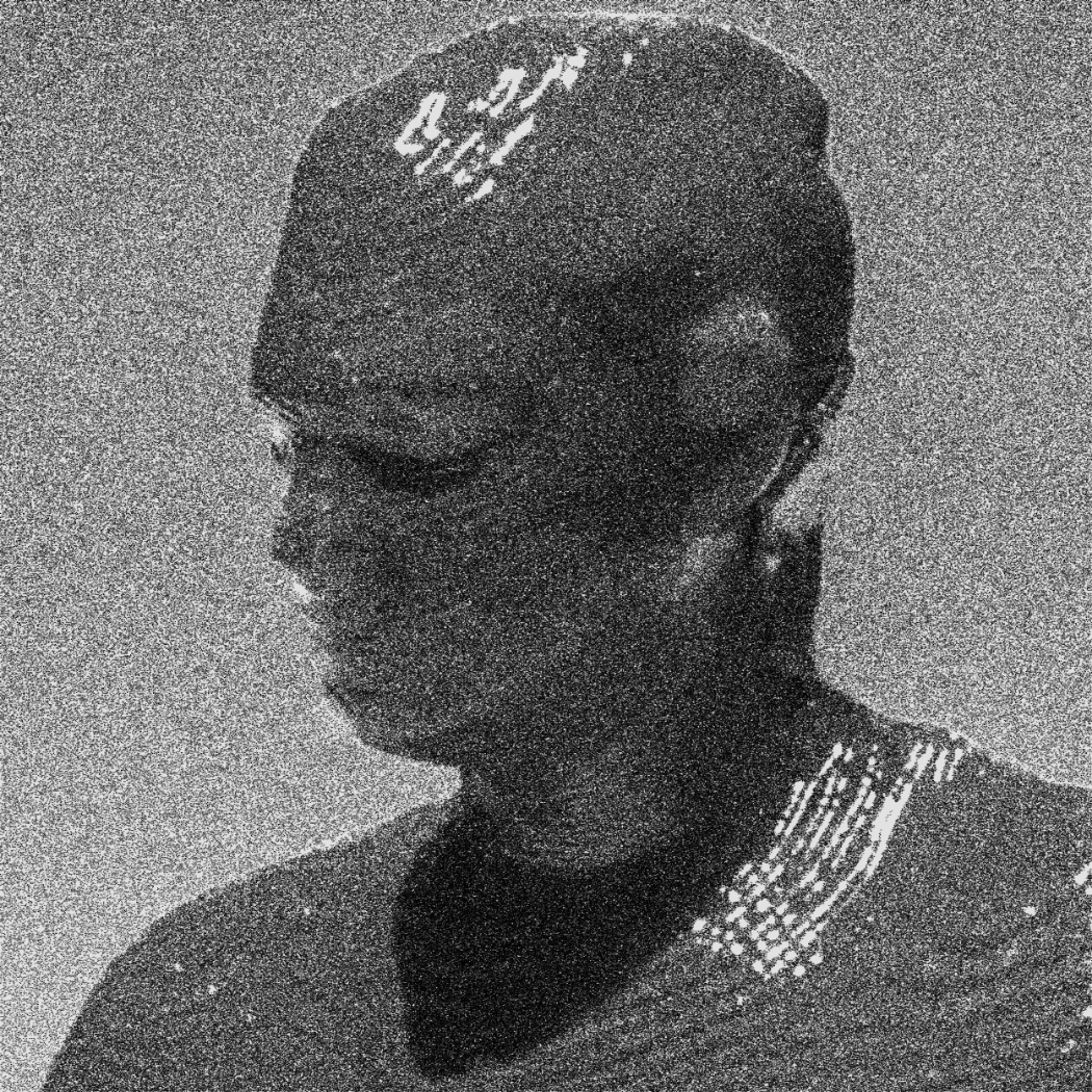 black and white headshot of Archie Lee Coates IV