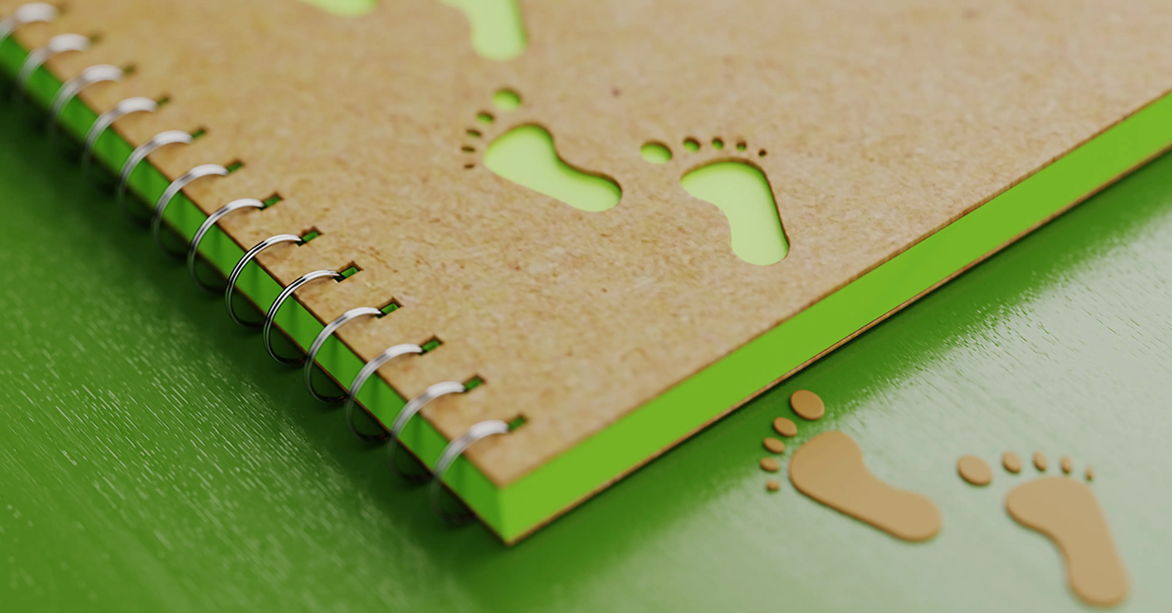 Notatbok med grønne fotavtrykk