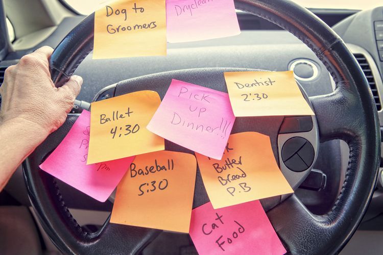 postit notes on steering wheel