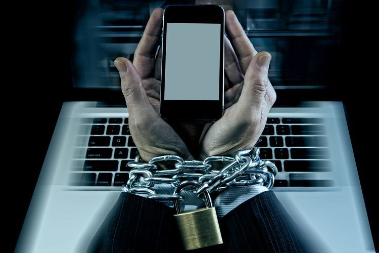 chained to phone and computer
