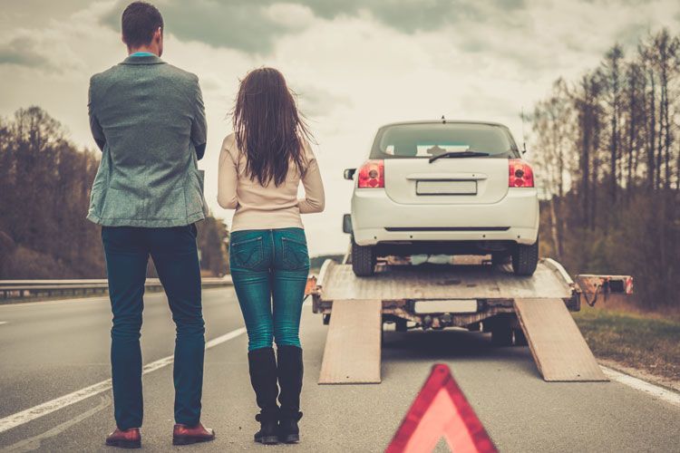 car insurance couple gets towed