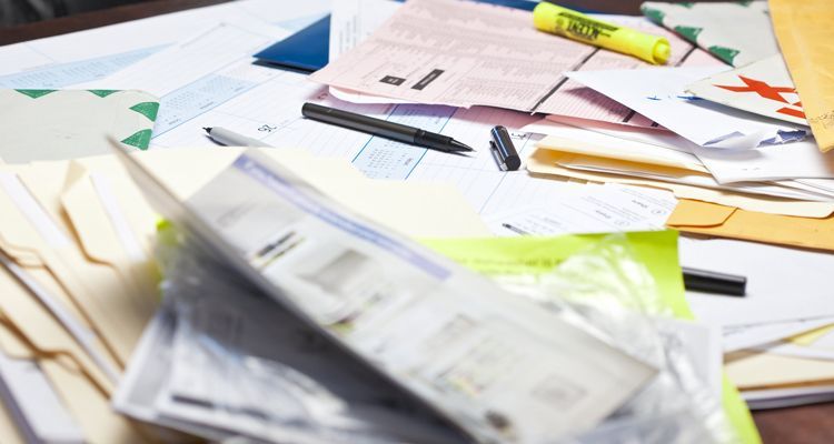 paperwork cluttering up a desk
