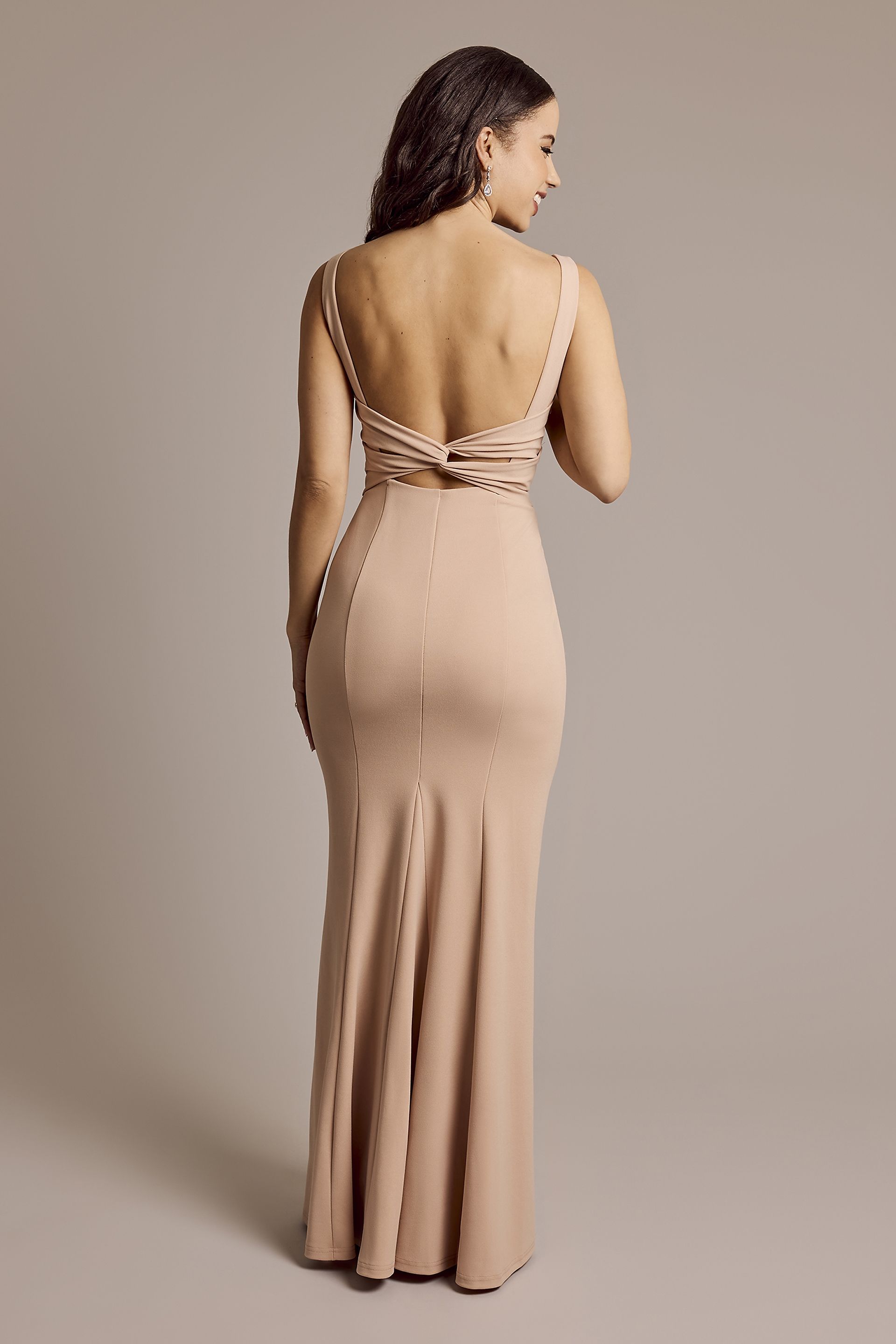 cut out mermaid dress fame and partners The Amore Dress is a two coloured mermaid dress with no sleeves and a heart shape cut out on the chest and knee area, covered with mesh. It is designed with love
