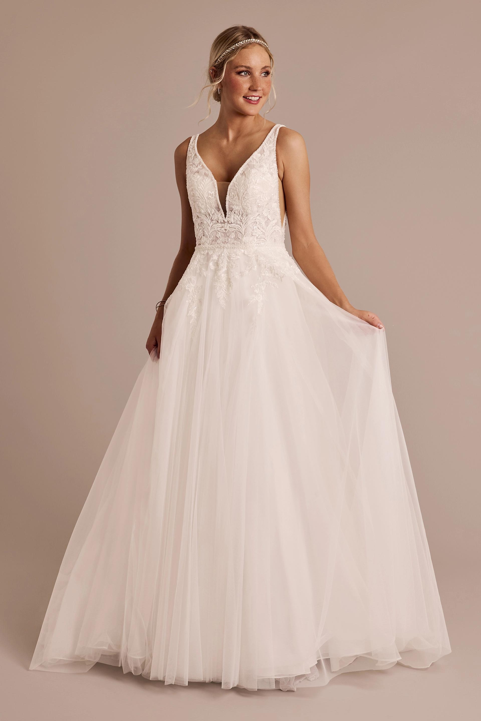 Oleg Cassini Plunging Neckline Lace And Tulle Ball Gown in Soft White Size: 6 David's Bridal