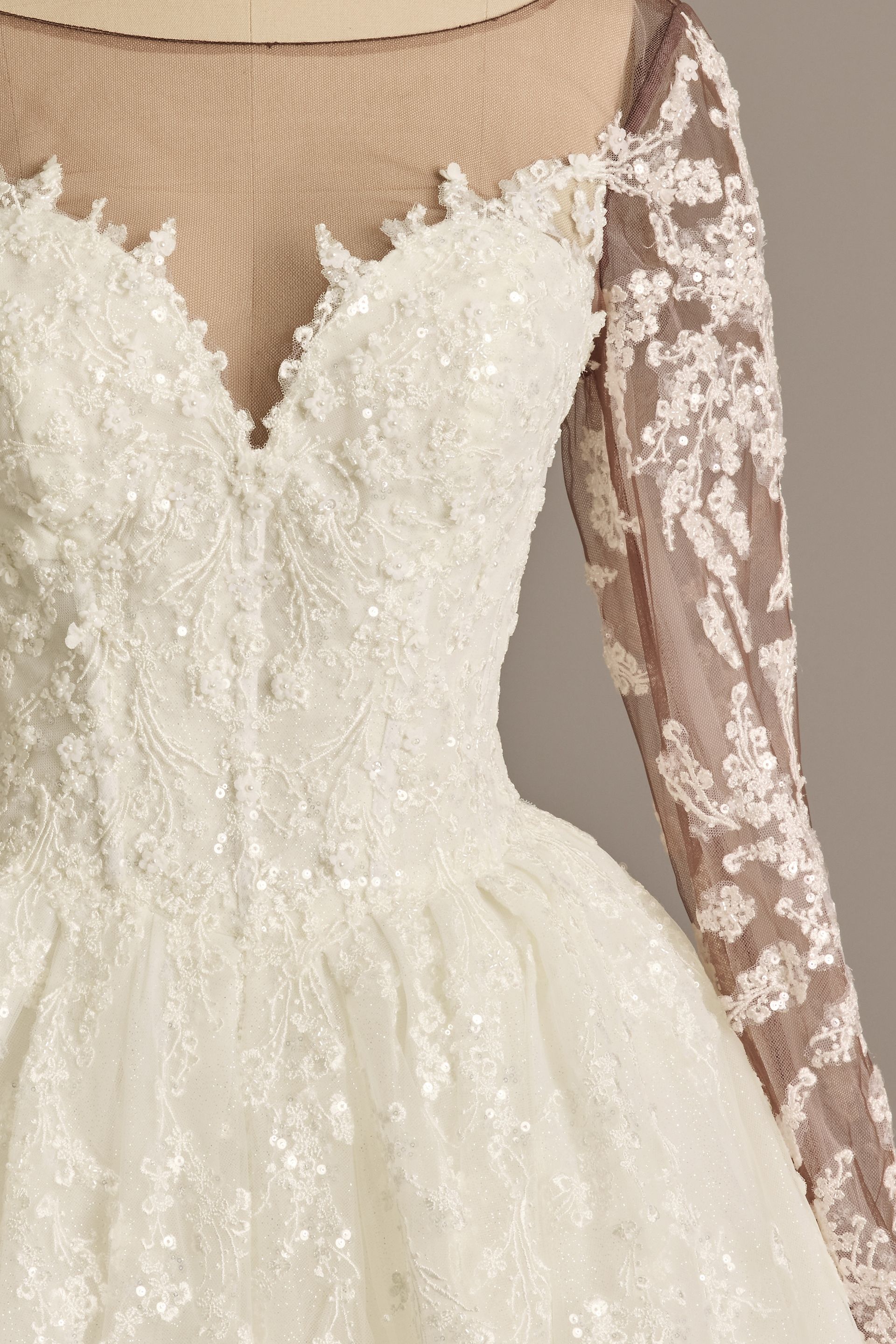 Oleg Cassini Lace Appliqued Illusion Long Sleeve Wedding Dress in Ivory/Stone Cocoa Size: 20W David's Bridal