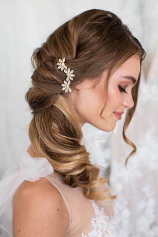 View Brides and Hairpins Triple Flower Swarovski Crystal Comb in all available color and sizes Picture of Triple Flower Swarovski Crystal Comb
