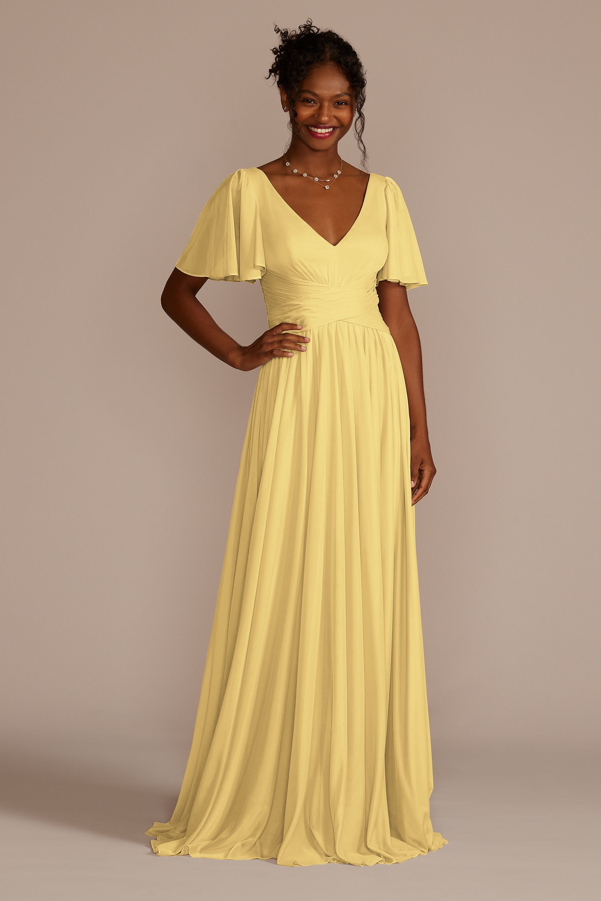 Celebrate DB Studio Flutter Sleeve Crisscross Mesh Bridesmaid Dress in Pale Yellow Size: 16 David's Bridal