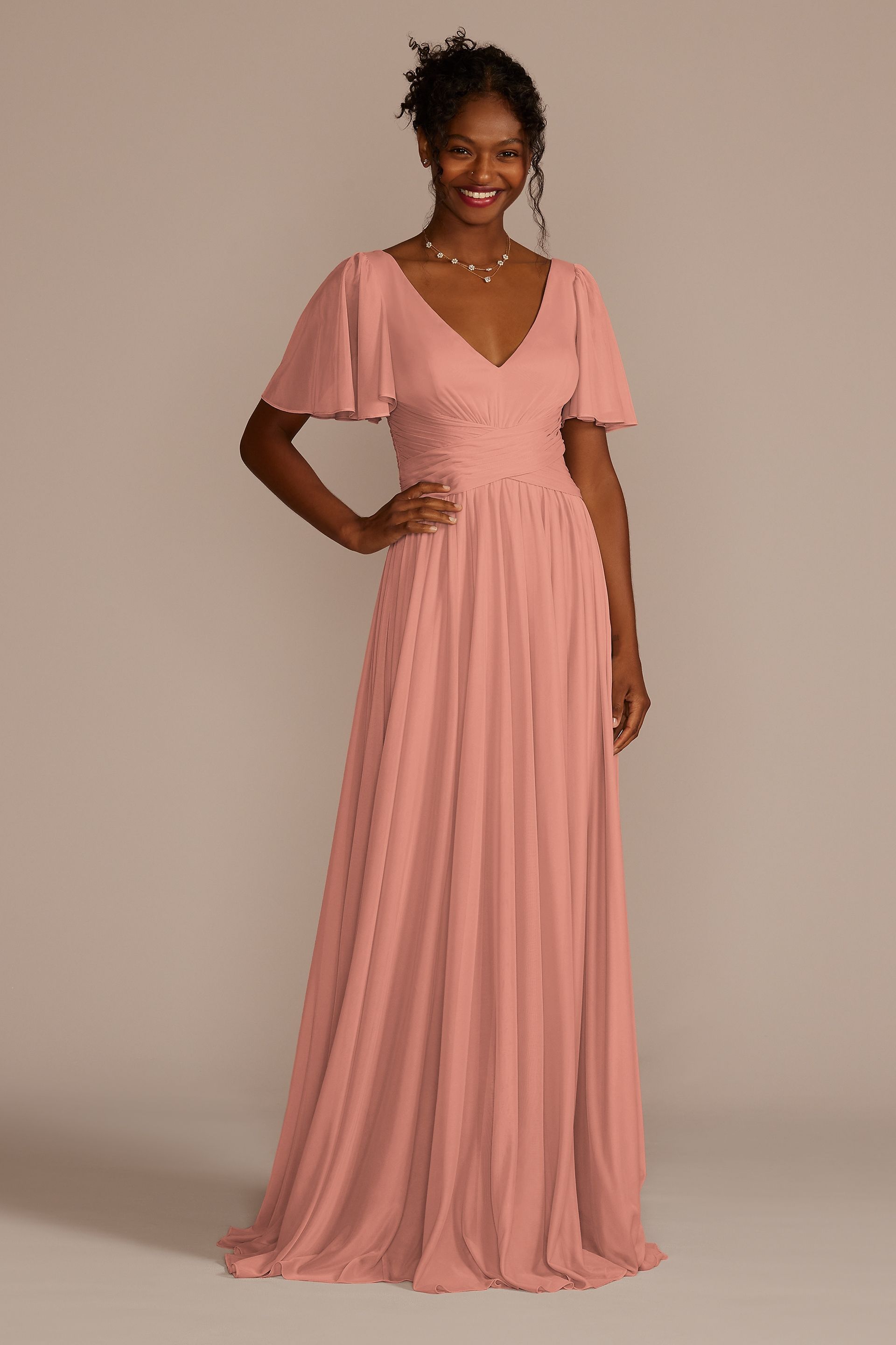 Celebrate DB Studio Flutter Sleeve Crisscross Mesh Bridesmaid Dress in Desert Coral Size: 26 David's Bridal
