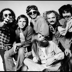 Jerry Garcia, left, and band members, left to right, Bob Weir, Phil Lesh, Brent Mydland (seated), Bill Kreutzman and Mickey Hart, are shown in the mid-'80s.