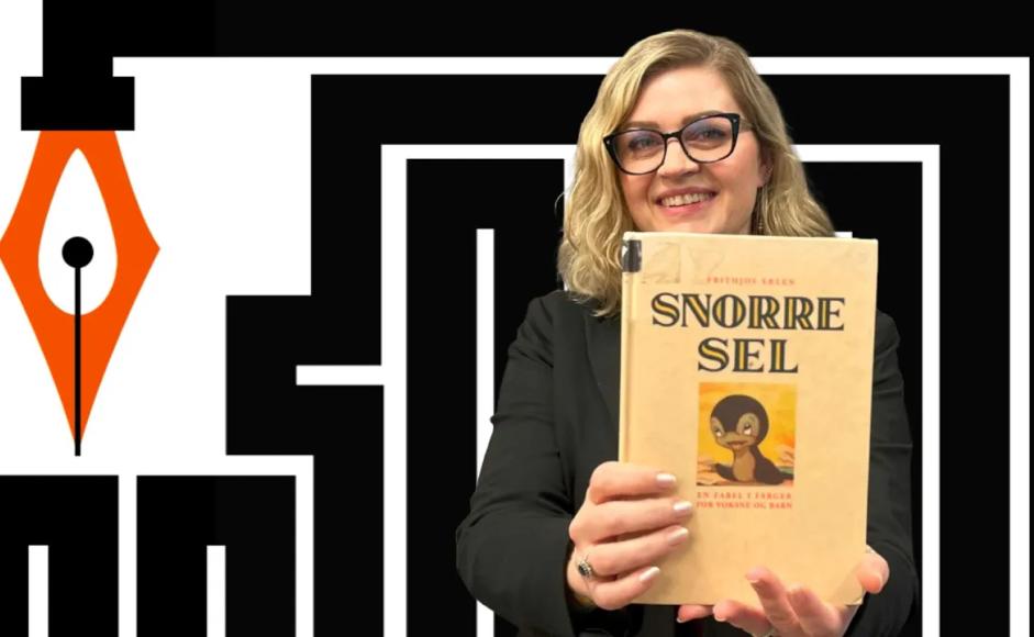 Marianne Hovdan holder boka Snorre Sel foran en logo for Ytringsfrihetsbyen Stavanger