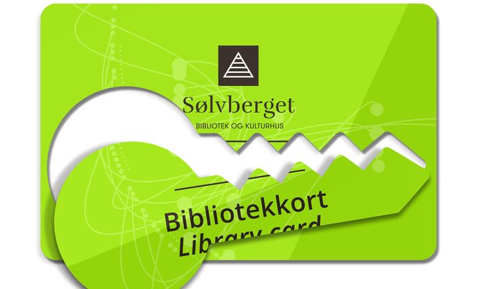 Et grønt bibliotekkort med en utstanset nøkkel.