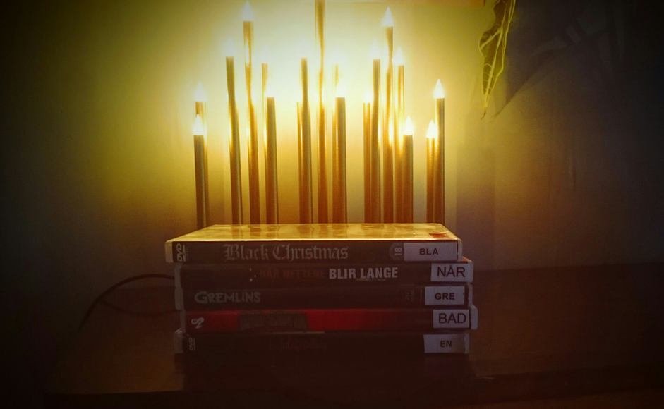 Julefilmer foran lys